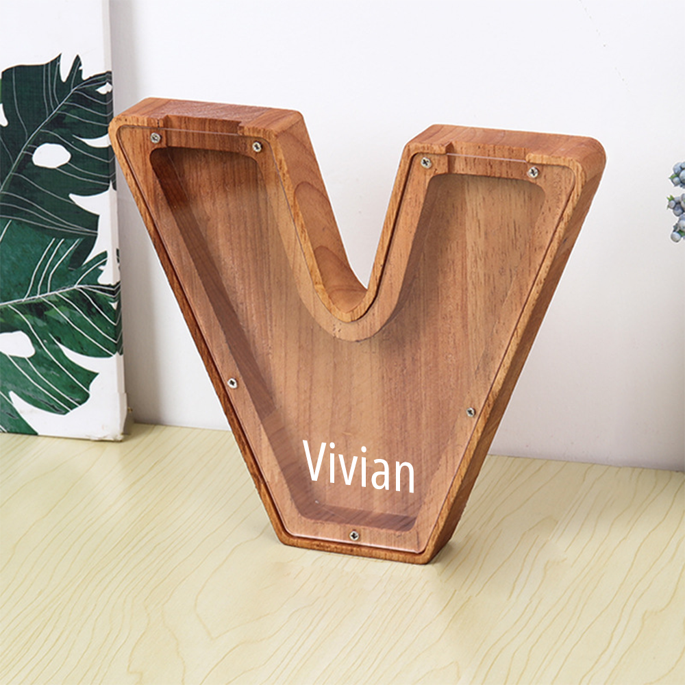 MadeMine personalised wooden piggy bank letter V shaped money box with clear front and name Vivian