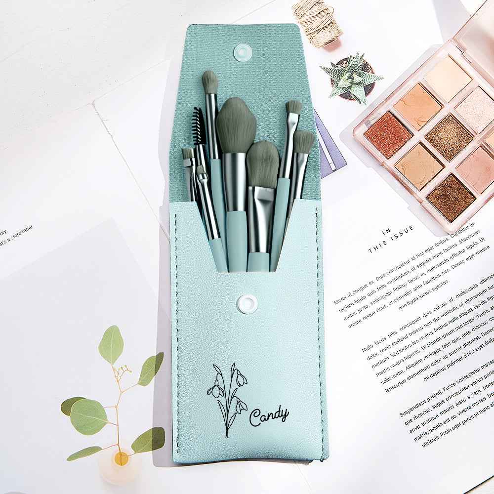 Personalized makeup brush set with bag in light blue case featuring floral design and various brush types
