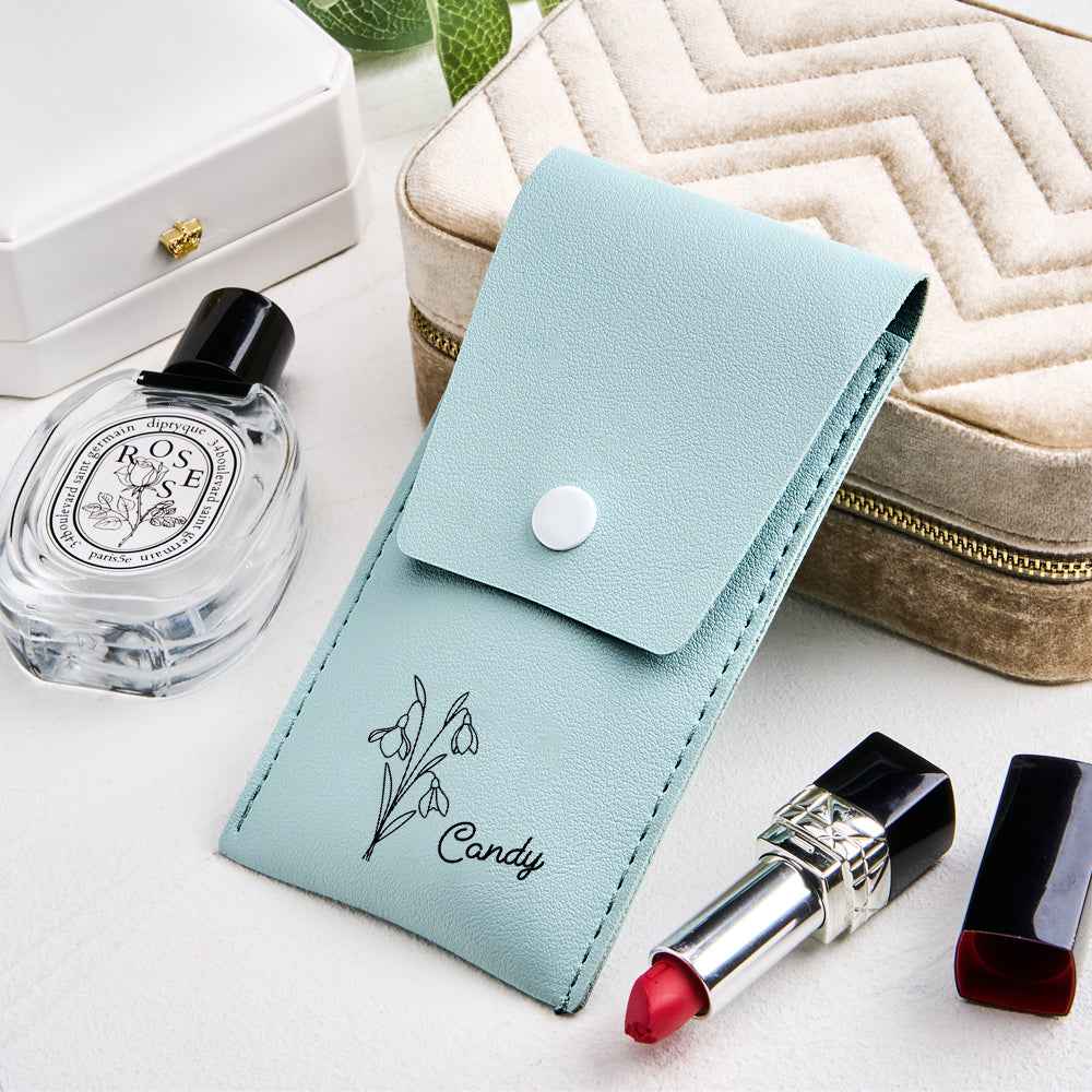 MadeMine personalized makeup brush set with bag in light blue faux leather with floral design and name Candy