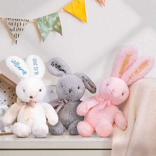 MadeMine personalised bunny rabbit toy trio in white grey and pink with embroidered names and dates on ears