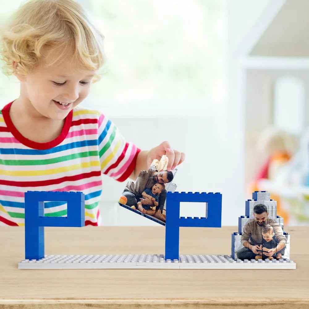 Child playing with a personalized dad photo puzzle featuring a father and child image on blue building blocks