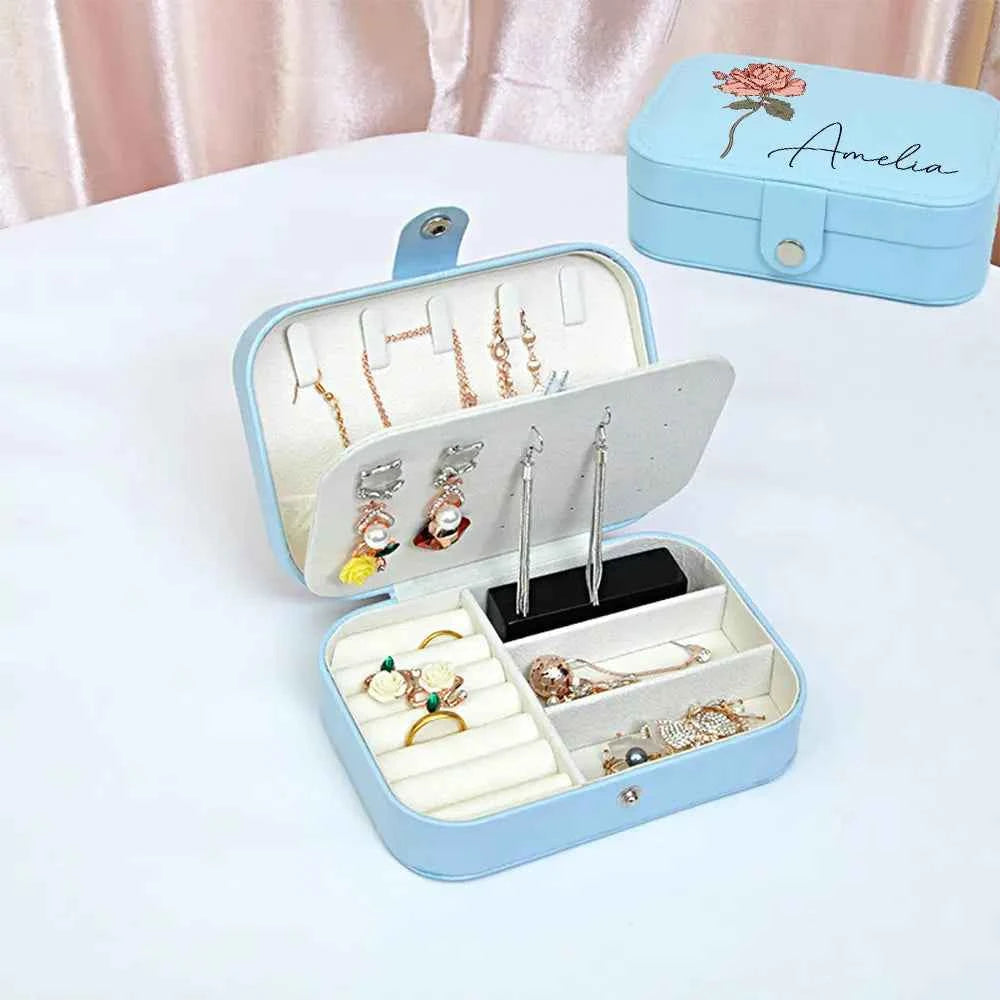 MadeMine light blue custom leather travel jewellery case open with ring rolls earring slots necklace hooks and compartments