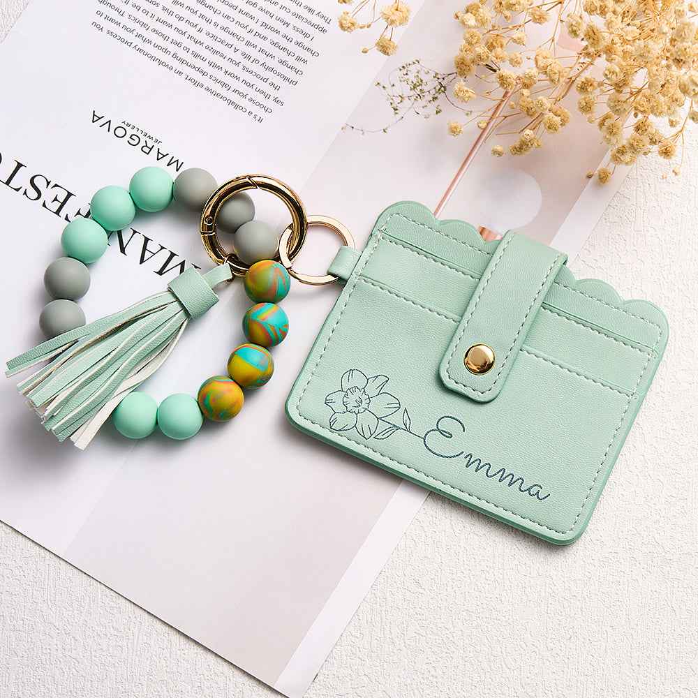 MadeMine personalized birth flower wallet in mint green with floral design and detachable beaded keychain