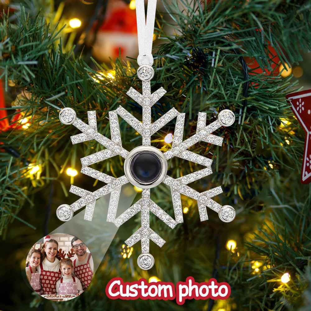 MadeMine personalized photo snowflake ornament hanging on Christmas tree with custom family photo