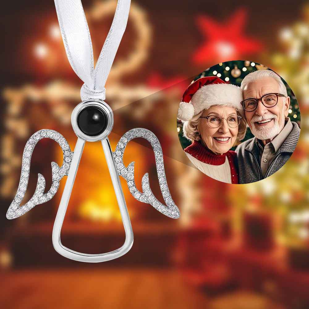 MadeMine personalized angel photo ornament with silver wings and black photo center hanging on white ribbon