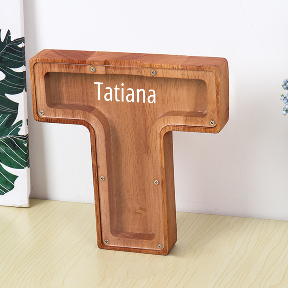 MadeMine personalised wooden piggy bank T shape with clear front display and custom name Tatiana