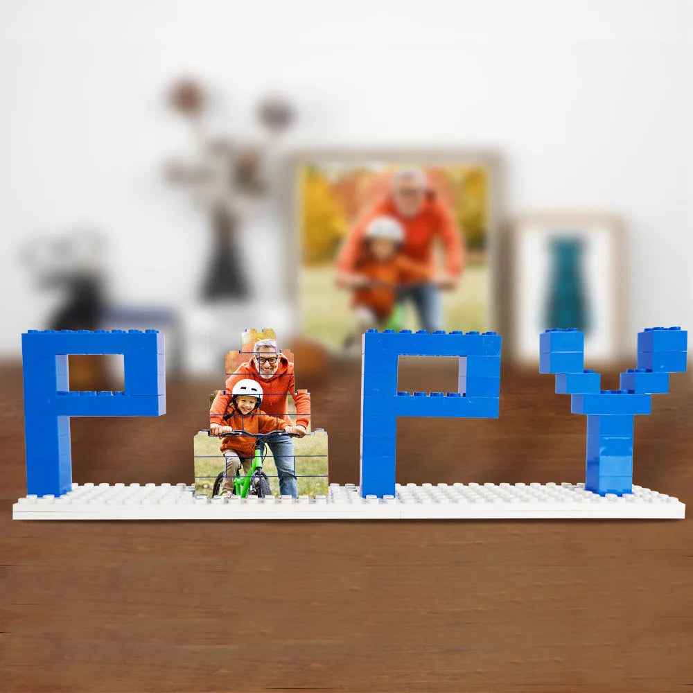 MadeMine personalized dad photo puzzle with blue block letters spelling POPY and custom photo piece