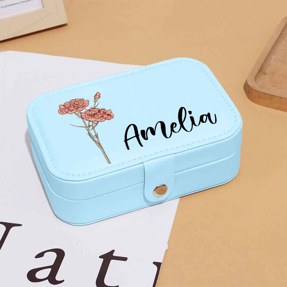 Light blue personalised custom leather travel jewellery case with Amelia name and floral print and snap closure
