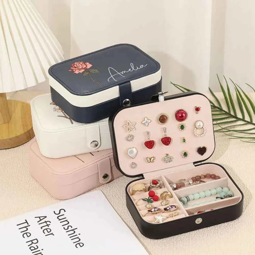 MadeMine custom leather travel jewellery case in navy white pink with personalised lid and open case showing rings and earrings
