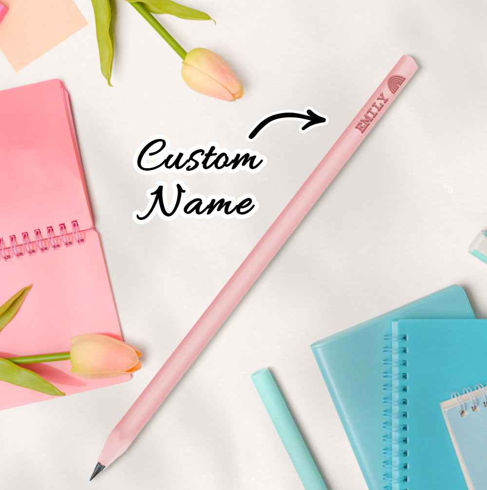 MadeMine pink pencil engraved with custom name Emily among notebooks and tulips personalised pencils for school